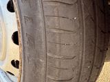 a close up of a flat tire on a truck