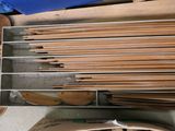 many wooden spoons and wooden spoons in a drawer