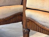 two chairs that are sitting next to each other on the floor
