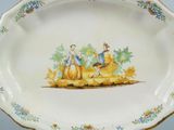 a plate with a picture of a man and a woman on it
