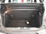 a bottle of wine in the trunk of a car