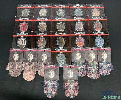a display of many pairs of socks with pictures on them