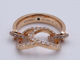 an image of a gold ring with diamonds on it