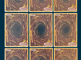 six square coasters with gold swirl designs on them on a blue background