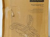 a cardboard box with a picture of a pair of scissors in it