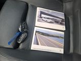 a picture of a car seat with a remote control and a picture of a car