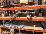 many shelves with different types of metal bars on them