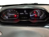 a close up of a car dashboard with a speedometer