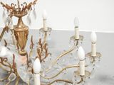 a chandelier that has a lot of crystal hanging from it