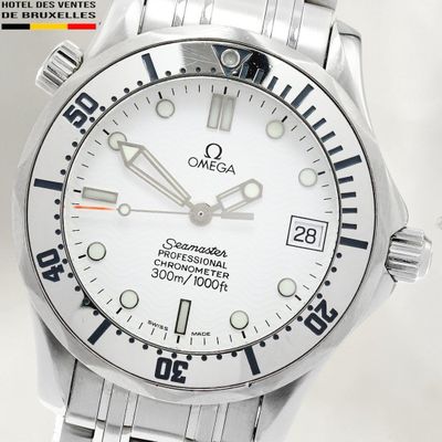 a silver watch with a white dial and black hands