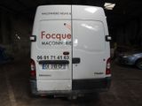 a white van that is parked in a garage