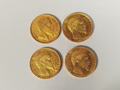 four gold sovereigns, one of which is a sovereign and one of which is a sovereign