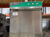 a silver refrigerator sitting on top of a pallet in a warehouse