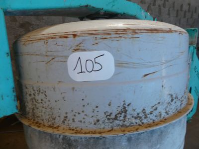 a metal barrel with a price tag on it