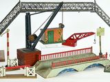 un circuit de train miniature avec un pont et un train sur les rails
