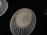 two plates that are sitting on a black table