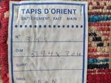 a close up of a label on a rug that says tapis d ' orientt