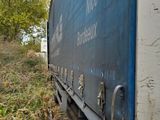 a truck that is parked on the side of the road