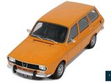 an orange car that is sitting on a white surface