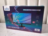 the box is open on the table with the tv in it