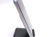 a close up of a cell phone on a stand