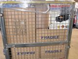 a metal cart with boxes on it in a warehouse