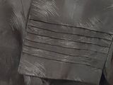 a close up of a piece of clothing on a hanger
