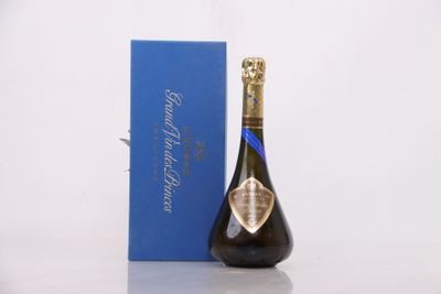 an image of a bottle of champagne next to a blue box