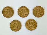four gold coins with a picture of a man and a woman on them
