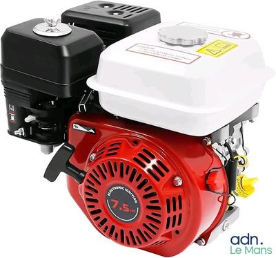 the small engine is red and white on the white background