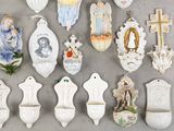 a lot of religious figurines that are on the table