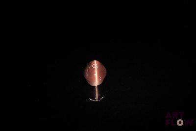 an image of a close up of a person ' s finger in the dark