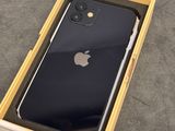 a box with an iphone in it sitting on top of a table