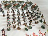 a lot of toy soldiers that are sitting on a table
