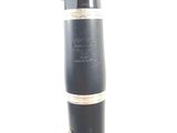 a black cylinder with a silver ring on top of it