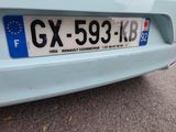 a close up of a car ' s license plate on the back of a car