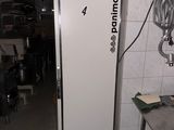 an image of a kitchen with a refrigerator in it