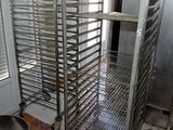 an image of a commercial kitchen with stainless steel racks