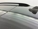 a close up of a car ' s windshield with a reflection on it