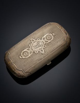 a close up of a small case with a cross on it