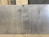 a metal plate that is sitting on top of a table