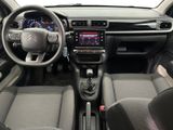 the interior of a car with a steering wheel, dashboard, and dash board