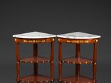 a pair of neoclassical style side tables with marble tops