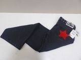 jeans with a red star on the back of them on a white surface