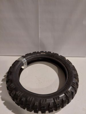 an old tire on a white surface with a white background