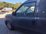 an image of a van parked on the side of the road