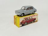a small toy car sitting on top of a box