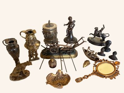 a lot of antique items that are sitting on a table