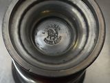 a close up of a metal object on a table