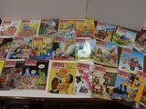 a lot of comic books on the table